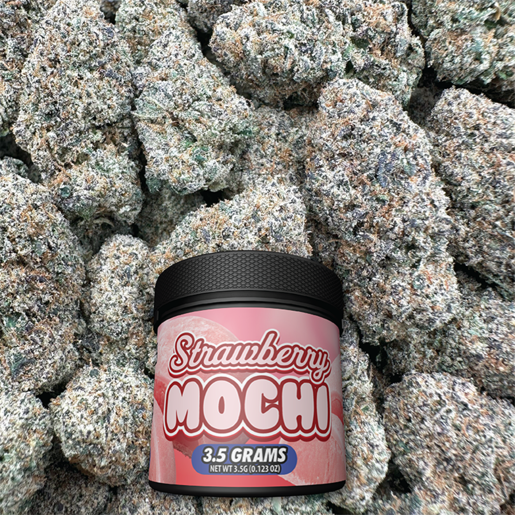 Container of strawberry mochi on a bud background